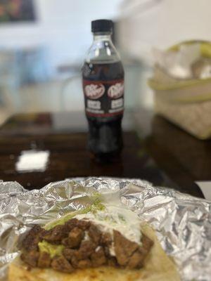Steak Taco flour tortilla with guacamole and sour cream