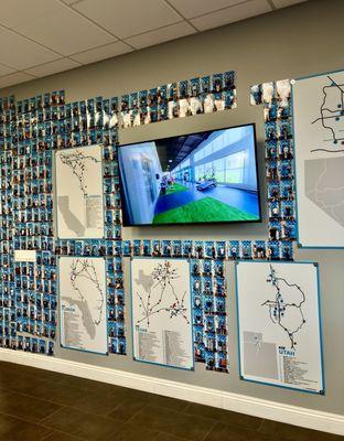 Maps of all their locations in different states and a wall full of people that have already signed up for this spot!