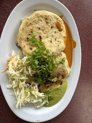 Pupusas with very spicy sauces.