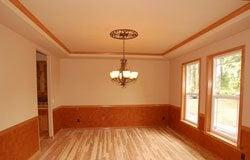Dining Room after we completed drywall, painting, millwork & flooring work.