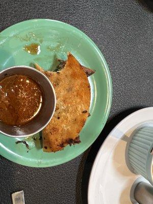 Burria taco with dipping sauce