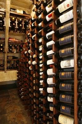 Under the stairs closet converted into wine cellar with Closet Wine Cellar patented racking system.