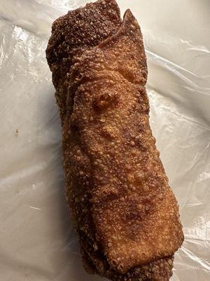 Look at this burned up "Shrimp Egg Roll". It was supposed to be shrimp, the inside looked like shredded beef. Garbage!