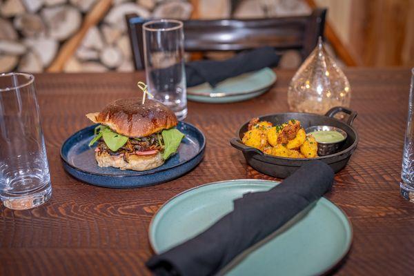Our grilled onion smash burger & cheese curds put a composed spin on bar classics.