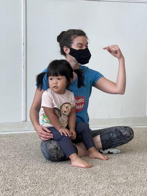 Angie participating in a song