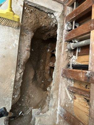 Drain repair under concrete