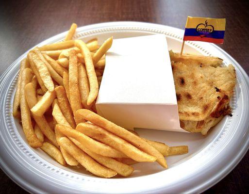Beef and ham stuffed Arepa with fries