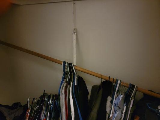 Broken closet after hanging clothes