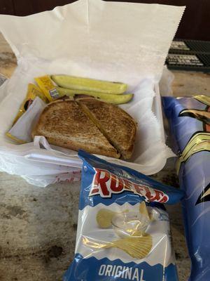 Fried bologna sandwich with grilled onions and American cheese