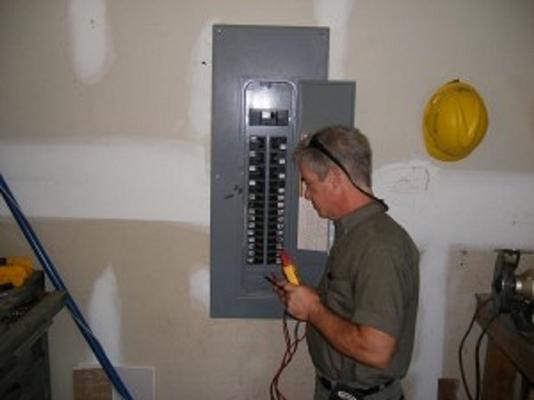 Dan Harper (Owner) - Working on a panel.