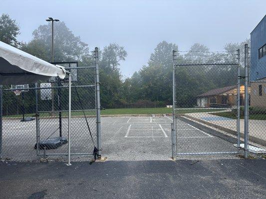 A man mowing the backyard at 7am