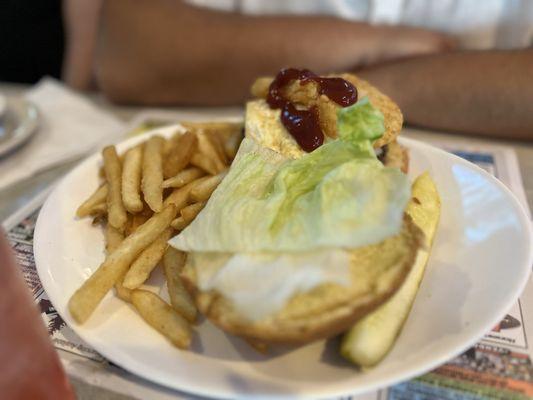 Burger with egg (forgot the menu's name). Consumer enjoyed it. Served extremely hot.