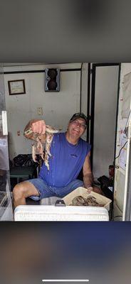 This is Eddie showing off his catch. Photo courtesy of www.rickpicks.com