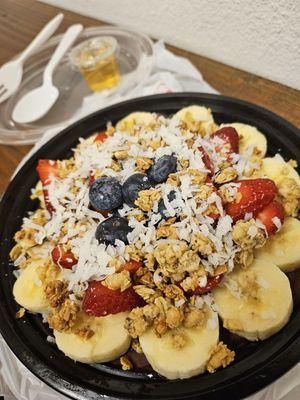 Regular acai bowl with shot of agave honey. $10