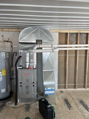 Furnace located on 2nd floor with ductwork installed in ceiling space below.