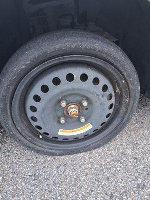 A spare tire w/flat