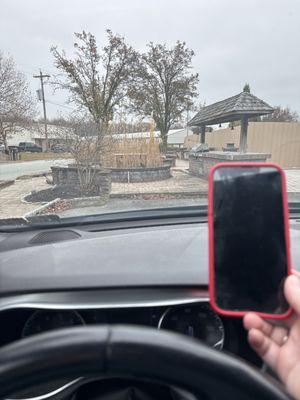 My son's phone and a really cute outdoor grilling area that I want in my backyard.