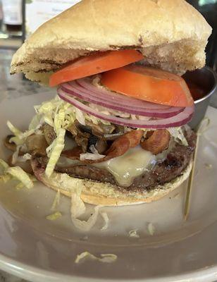 Sautéed mushroom bacon and Swiss burger cooked perfectly!