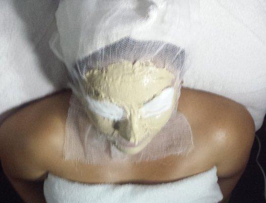 getting a facial treatment