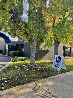 North Side of building. Our entrance is under the blue awning