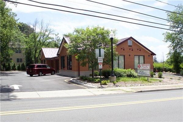 Across from the 7-11 on Grand Ave, Montvale. One block from NJ Transit Train Station.