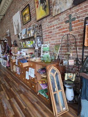 The interior of the store with a great variety of items, many from local artist or craftmen and women.