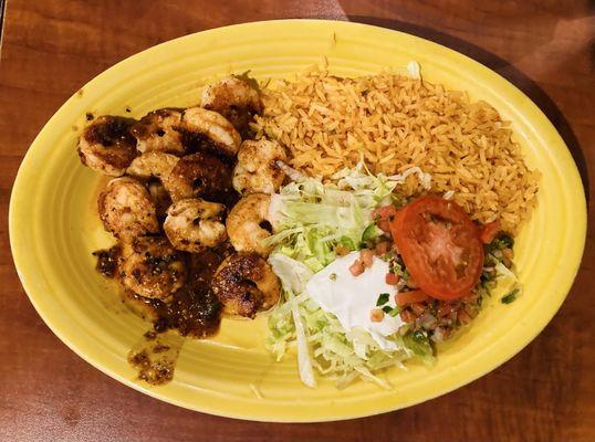 Camarones a la Diabla - Grilled Shrimp with Signature Chile de Arbol Hot Salsa. Served with Rice, Sour Cream Salad with Pico de Gallo.