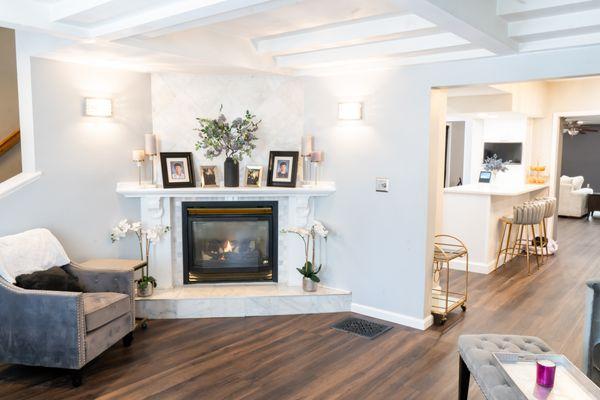 Customer had 7 different types of flooring in their house. We removed those floors and installed new floor throughout, opening the space.