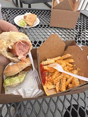 Three Classics.... cheese fries, crispy chicken and hot dog with sauerkraut!