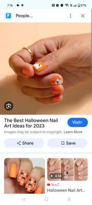 They matched this photo for Halloween nails