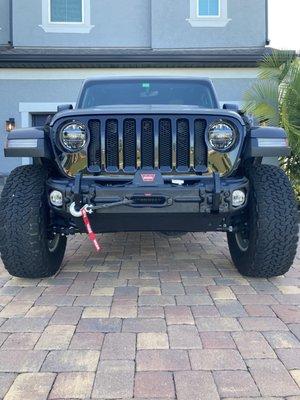 Front bumper, skid plate and winch installed