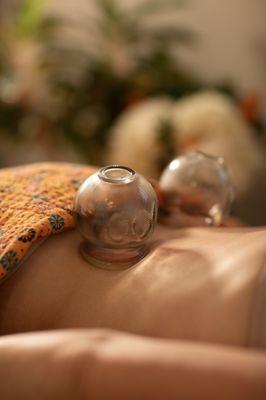 Fire cupping helps move stagnant qi and blood (think of it like a deeper massage) to loosen things up and get energy flowing harmoniously.