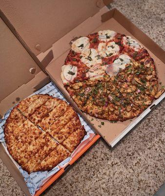 Garlic sticks with cheese, half-half pizza: original margherita & butter chicken