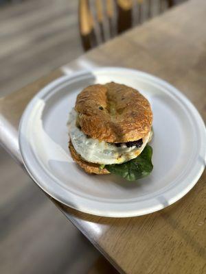 The Sonoran - Spicy Chorizo, cheddar, baby spinach, fried egg on a Jalapeno Cheddar Bagel. Get the egg over easy and add a second egg.