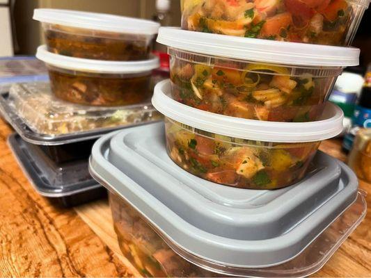 A variety of freshly prepared, chef-crafted meals packed and ready for delivery, showcasing Chef Joe's personalized meal prep...