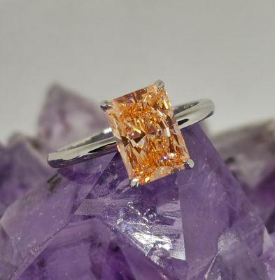 Fancy Vivid Orangy Pink Platinum Solitaire
3.37 carat