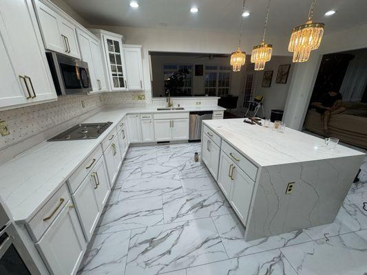Calacatta gold quartz countertops with under mount sinks