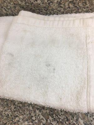 Dirty - stained bathroom towels