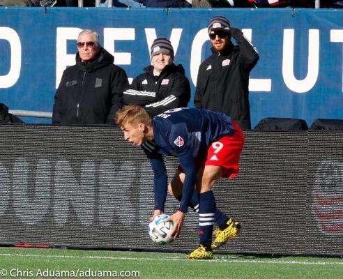 Dr. Adam Miller on the sidelines at the Revs home opener.