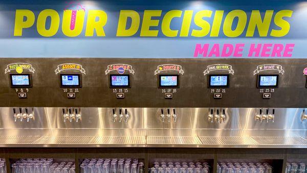 Self-serve tap wall offers many options such as beer, wine, seltzers, sours, and kombucha.