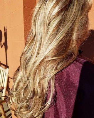 Beautiful long hair with hi-lights and low-lights