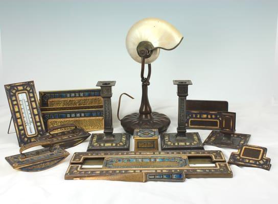 A large stock of Tiffany Studios bronze, enamel and metalware as well as lamps and lighting. We specialize in antique Tiffany
