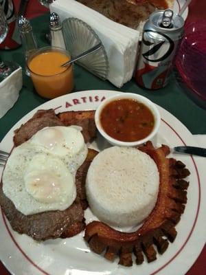 Fantastic.  Steak,  eggs,  pork,  beans,  and rice.