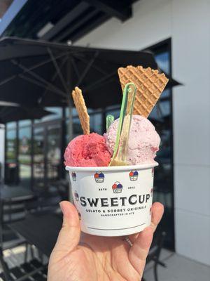 Small cup with 3 flavors- strawberry gelato, mango gelato, and raspberry sorbet.
