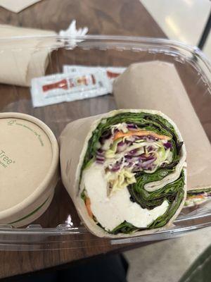 Tofu wrap and peanut sauce on the side