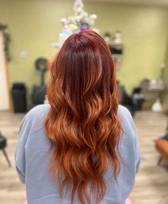 Copper balayage with red root melt.