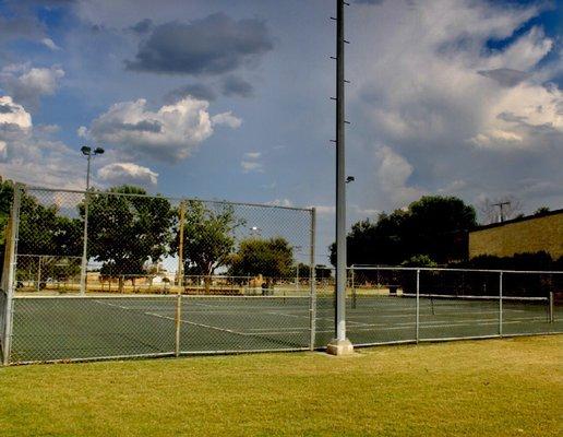 Lighted tennis courts that are fully fenced