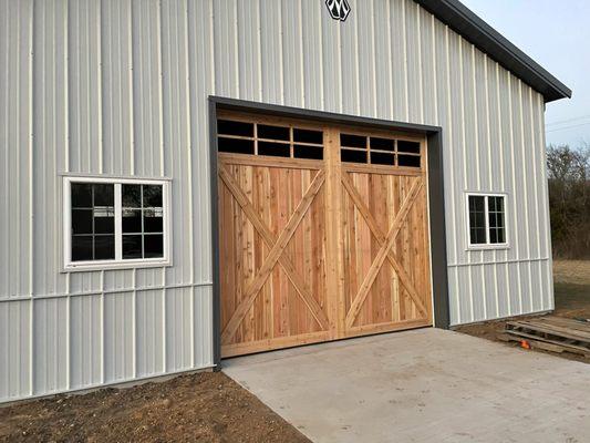 New install of 12 x 10 all wood Cedar Doors  south end of barn