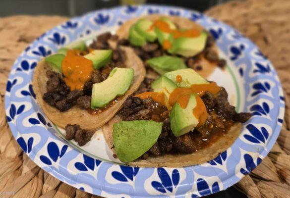 Carne Asada tacos with avocado