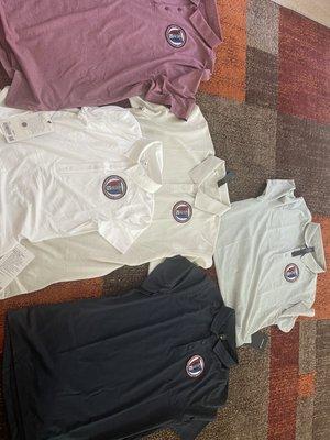 Patches (purchased elsewhere before I knew she also did that) that she sewed onto various polos.